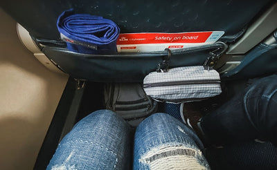 visible lifestyle ^^ An HLT1 clipped to the back of an airplane seat pocket with carabiners.