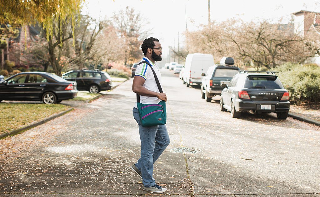 lifestyle visible^^A person carrying the Icon as a shoulder carry.