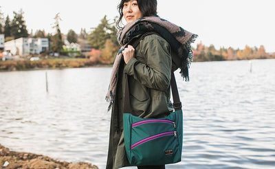 detail visible^^A person carrying the Icon as a shoulder bag.