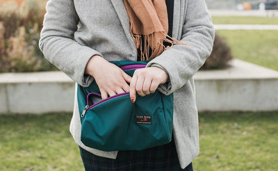 lifestyle visible^^A person accessing the front compartment of the Icon.