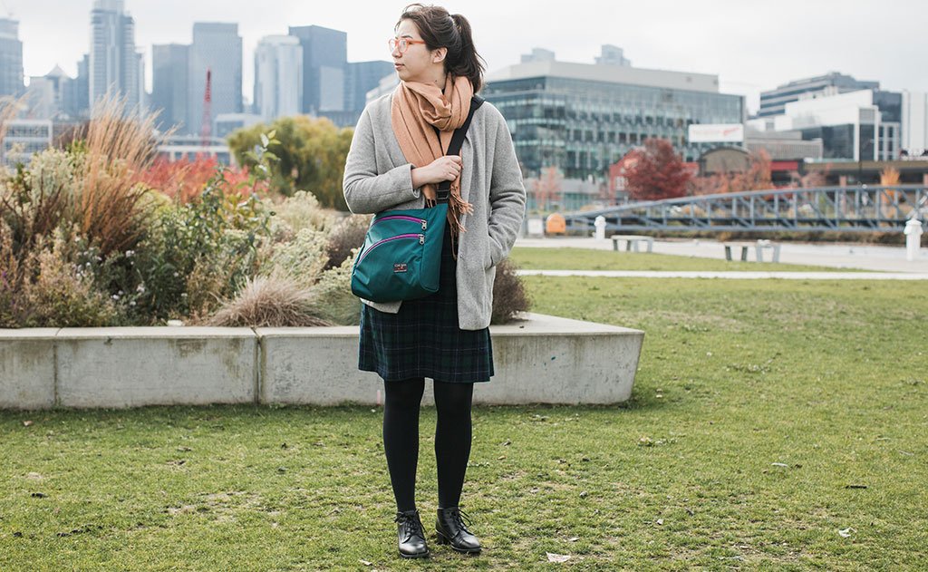 lifestyle visible^^A person carrying a Icon crossbody.