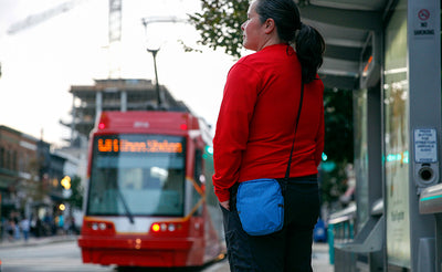 lifestyle visible^^Person wearing the Everyday Cubelet while waiting for public transit.