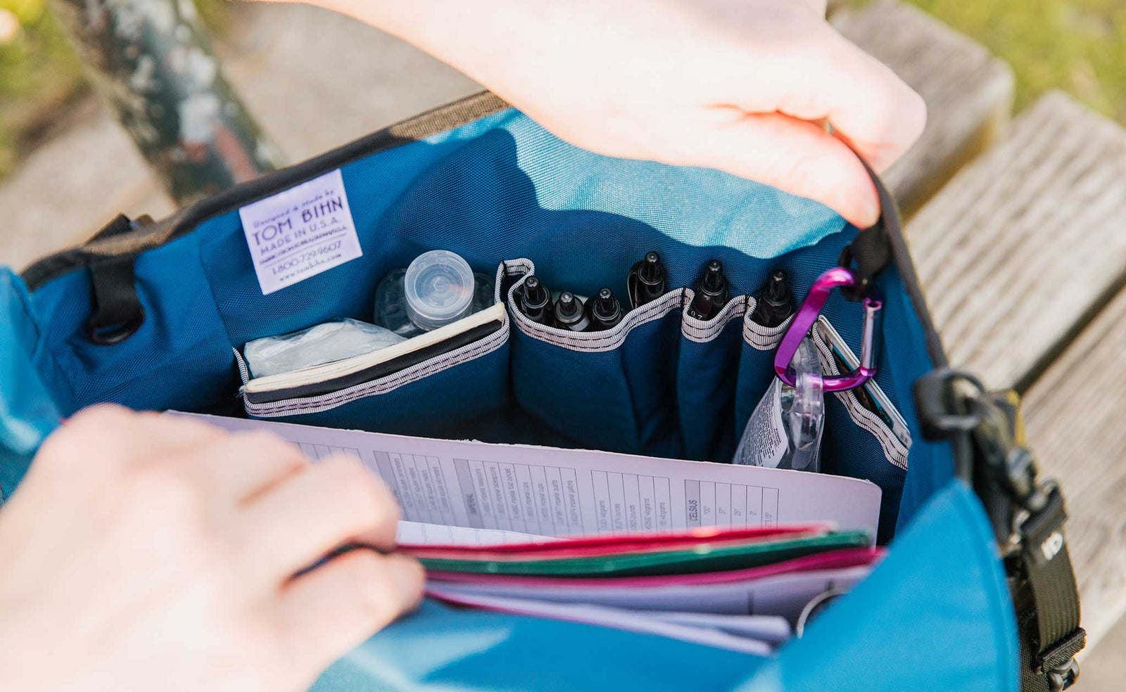 lifestyle visible^^Close-up of the inside organizational pockets of the Large Cafe Bag.