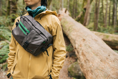 lifestyle visible^^Person wearing the LGD sling style, front-carry.