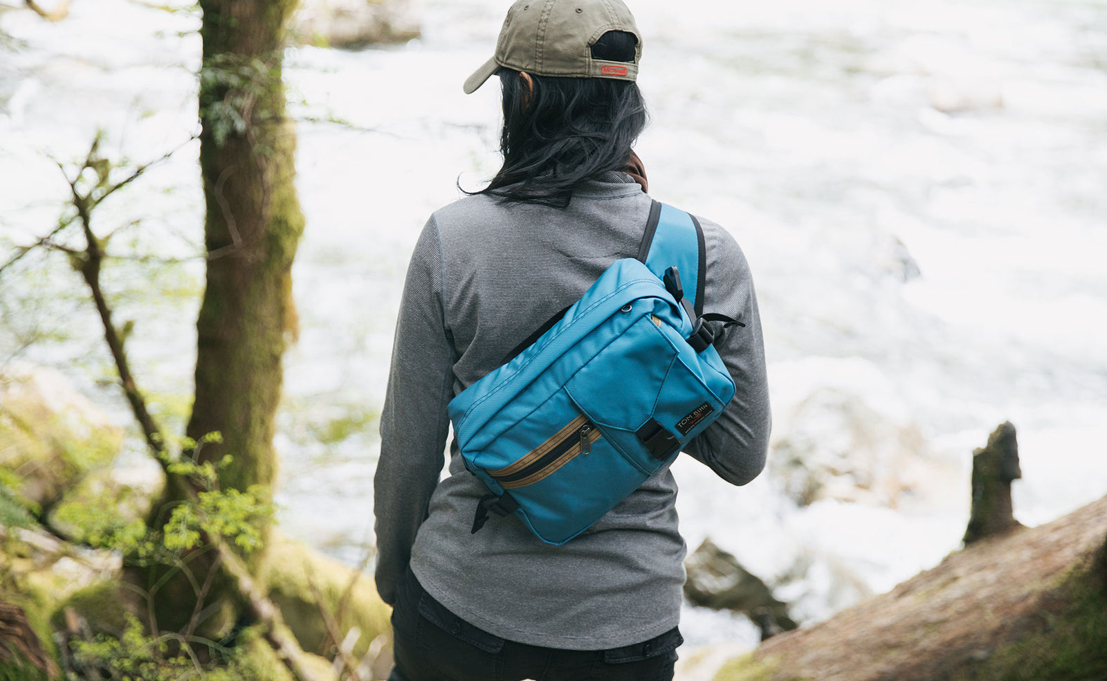 lifestyle visible^^Person wearing the LGD sling bag style.