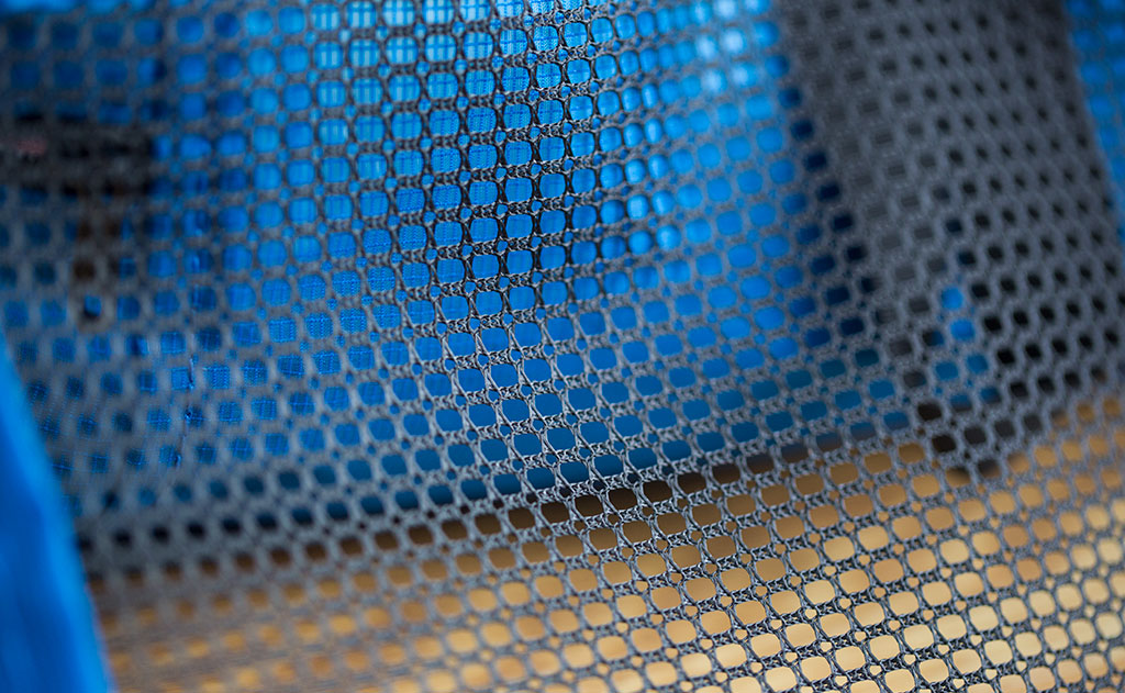 ^^A close shot of the mesh on a Tri-Star Packing Cube.