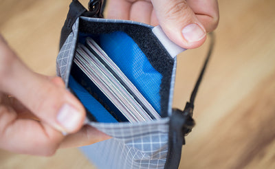 detail visible^^4 US Passports in a Passport Pouch.