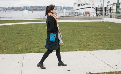 lifestyle visible^^A person carrying the P.I.K.A. Pouch.