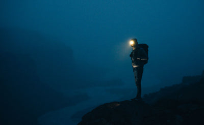 visible lifestyle^^A person night hiking with the Original Shadow Guide 31.