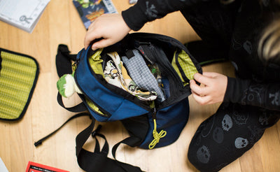 detail visible^^A child opening their full Sprout.