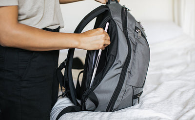 visible lifestyle^^person using laptop pocket