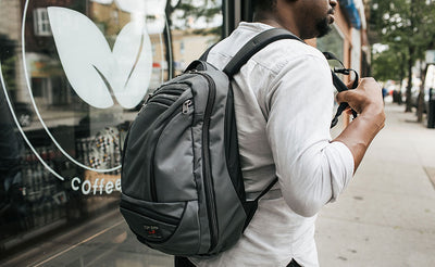 visible lifestyle^^Person wearing Synik 22 outside of a coffee shop