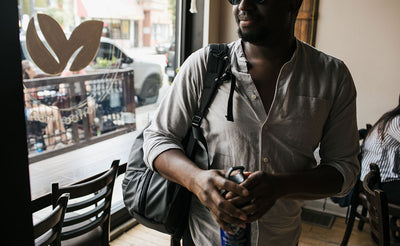 person wearing Synik 22 on one shoulder