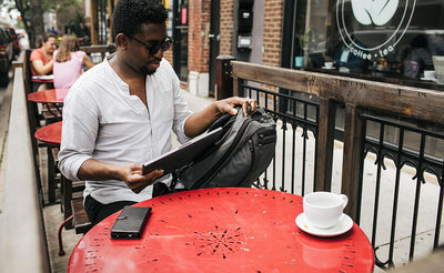 visible lifestyle^^person putting laptop into side laptop pocket