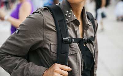 visible lifestyle^^Close up of shoulder strap with sternum strap fastened
