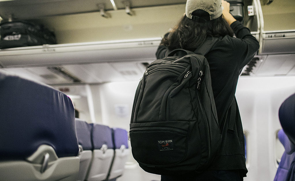 ^^A person on a plane with their Synik 30.