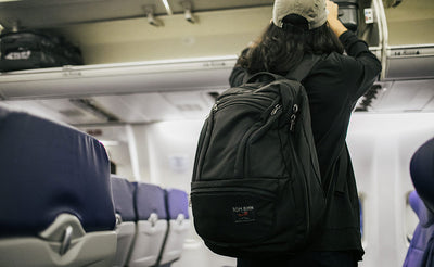 ^^A person on a plane with their Synik 30.