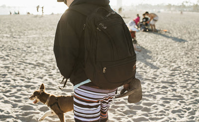 A person wearing the Synik 30 at the beach.