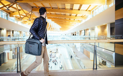 lifestyle visible^^A person walking across a bridge wearing a Cadet.