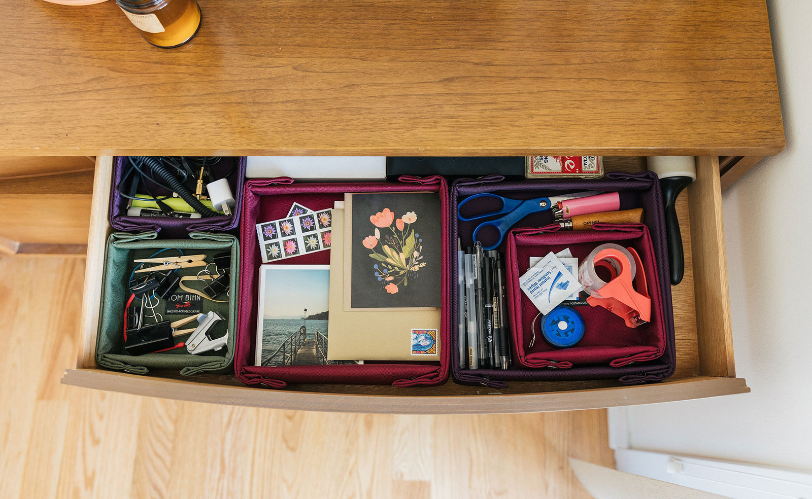 detail visible^^Various Tray Biens in a drawer: same shot as before but this time they're filled with various office supplies, stationary, stamps, etc.