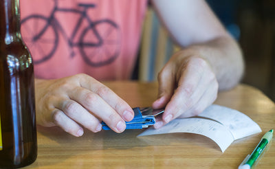 visible variant TB1275-BJ TB1275-LJ TB1275-CJ TB1275-DJ TB1275-IJ TB1275-VJ TB1275-GJ TB1275-BH TB1275-DH^^A person pulling a card from a Nik's Minimalist Wallet.