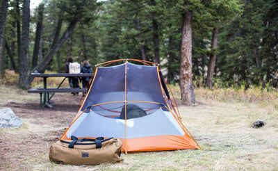 lifestyle visible^^ A Yeoman Duffel outside of a camping tent.