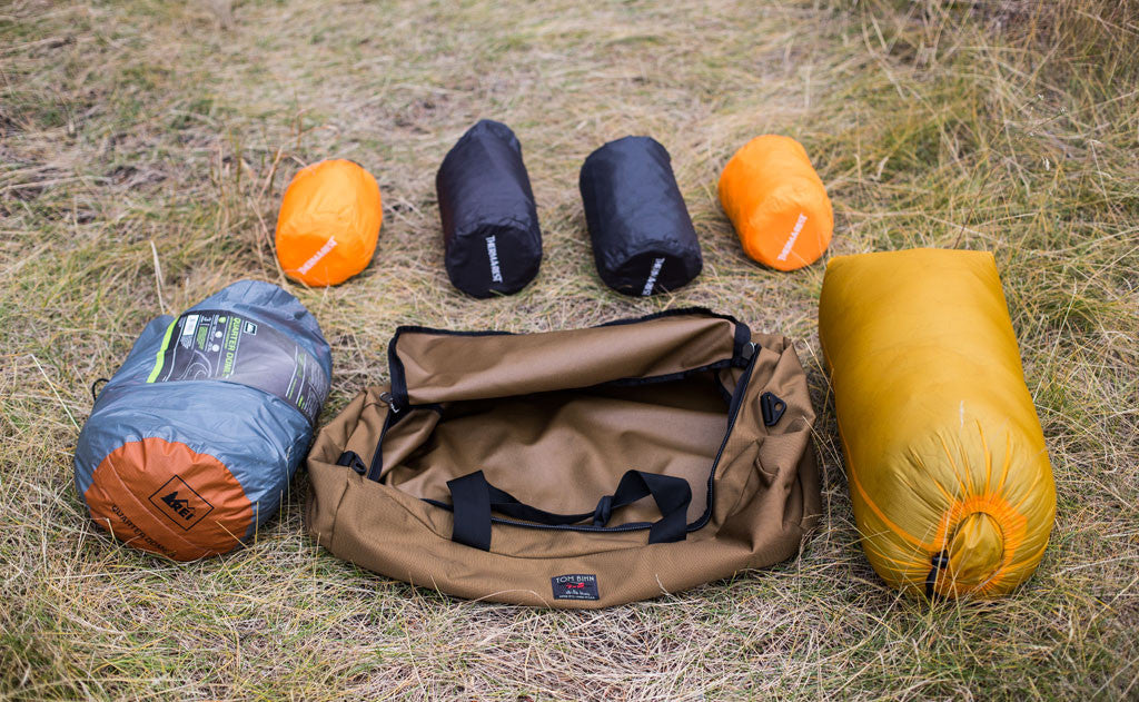 lifestyle visible ^^ A Yeoman Duffel surrounded by six large stuff sacks of camping gear.